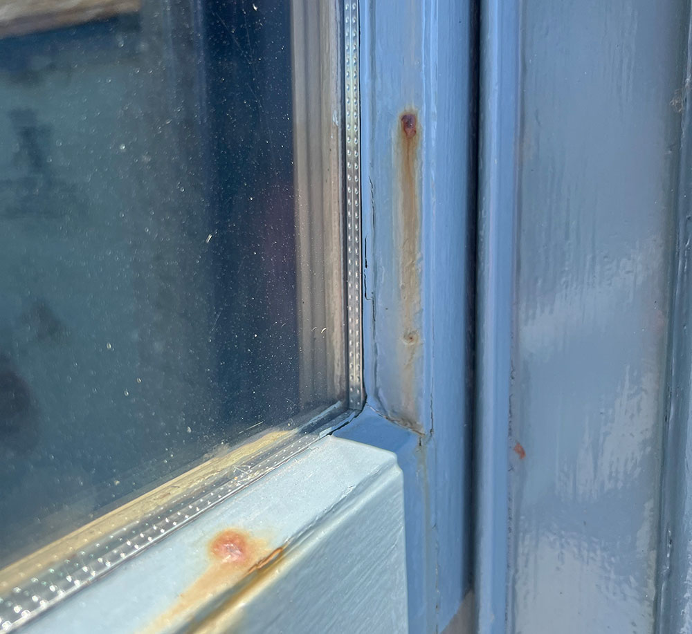 Rusted Pins on Window Pinning Bead